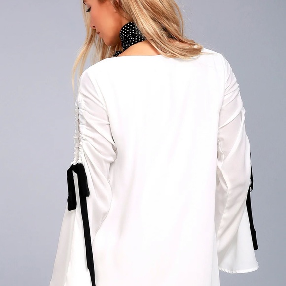 Lulu’s Cherish White Long Sleeve Shift Dress With Black Bow Detail. - Picture 3 of 9